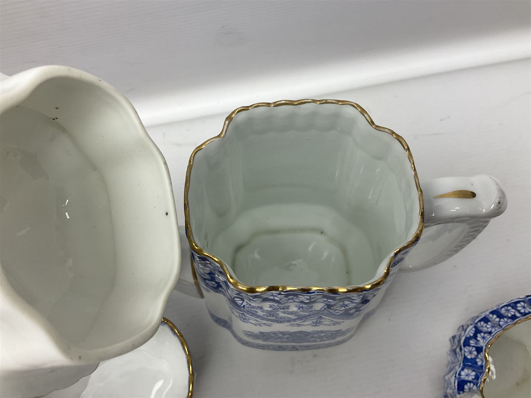 Late Victorian W T Copeland & Sons Primrose pattern coffee set for six, pattern no 2724, comprising coffee pot, milk jug, sugar bowl and six coffee cans and saucers, all upon a Lazy Susan, of circular form, with gilded rim and upon domed pedestal foot, with printed mark beneath, D44.5cm