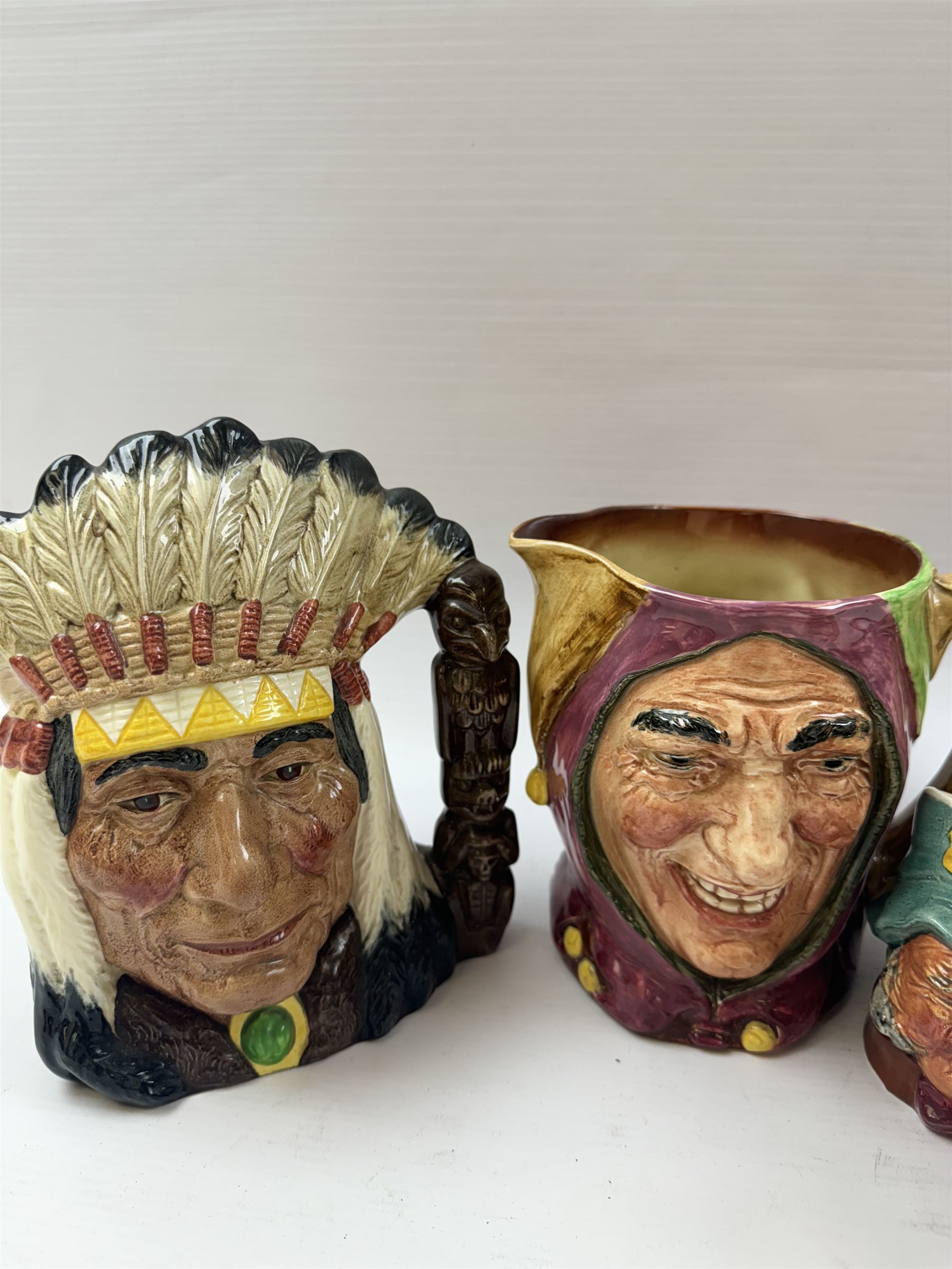 Collection of character jugs, including Royal Doulton Long John Silver, The Falconer, Granny etc