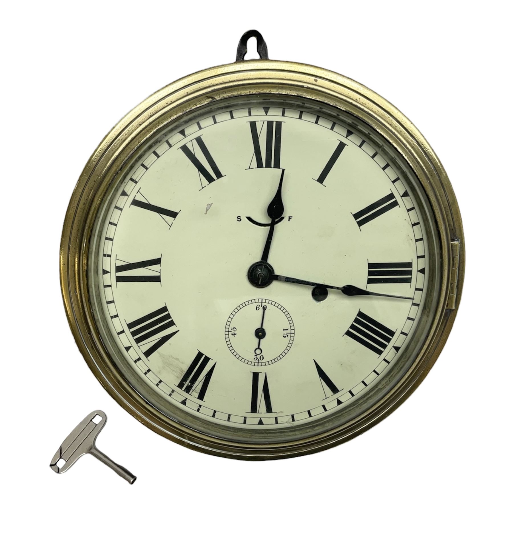 Seth Thomas ship's bulkhead clock with brass bezel and japanned case, the white dial with Roman numerals and subsidiary seconds dial D23.5cm; with key