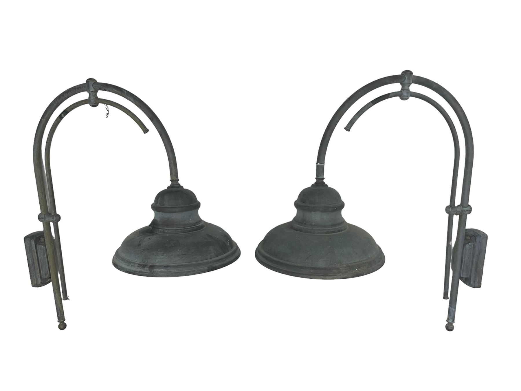 Two grey outdoor metal lamps, arched form with circular shades