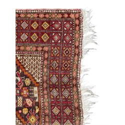 Persian Hamadan dark indigo ground rug, the field decorated with two connected pole medallions, decorated all over with small geometric and stylised bird motifs, geometric design border with repeating pattern 