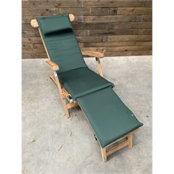 Pair of solid teak adjustable garden steamer armchairs, stainless brackets, with cushions