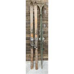 Two pairs of vintage skis, L207cm and 197cm