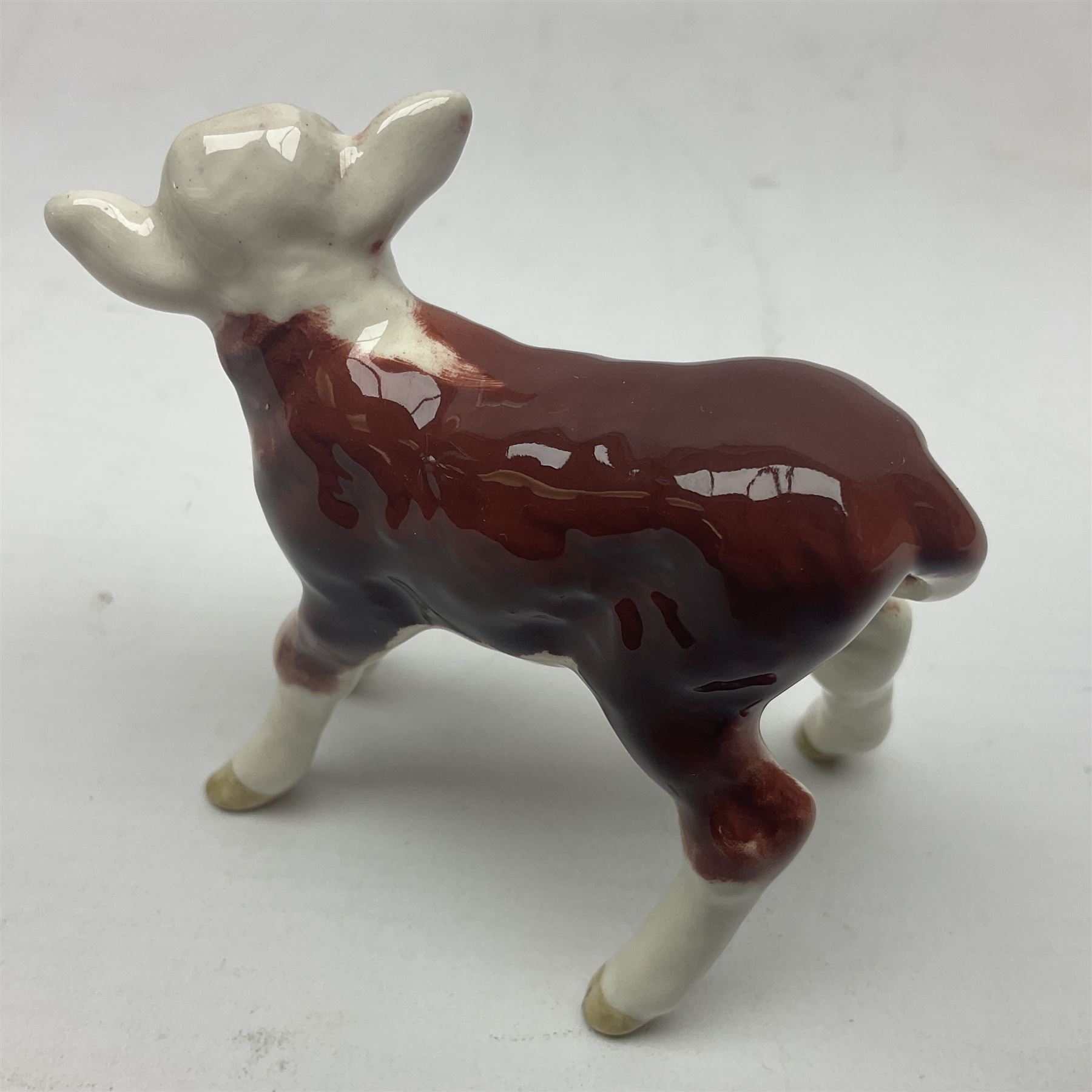 Beswick Hereford family group, comprising bull 1363, cow 1360, and calf 1406B