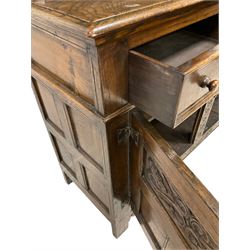 Georgian design oak dresser, two-tier plate rack with shaped aprons, the base fitted with two fielded moulded drawers, over two panelled cupboards carved with scrolling acanthus leaves, with guilloche carved central upright, on stile feet