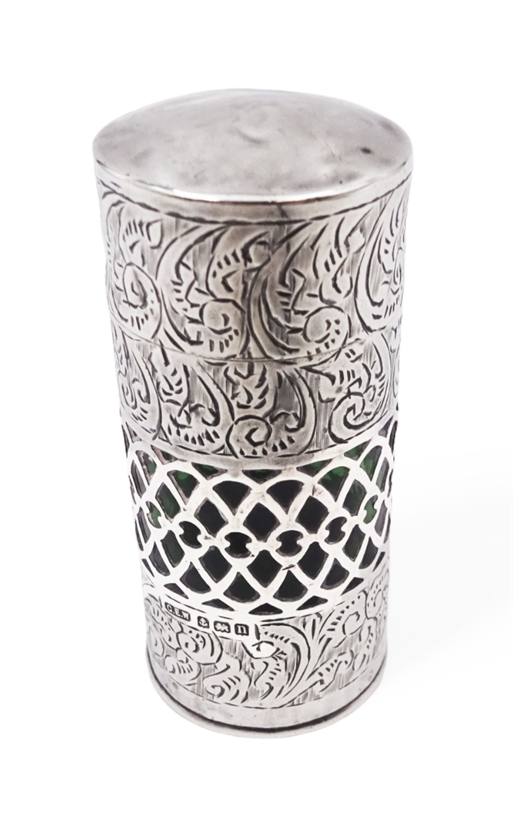 Early 20th century silver mounted green glass scent bottle, the silver body engraved profusely with foliate scrolls, with central pierced latte band revealing the green glass beneath, the hinged lid opening to reveal wooden stopper, hallmarked George Edwin Walton, Birmingham 1912, H7cm