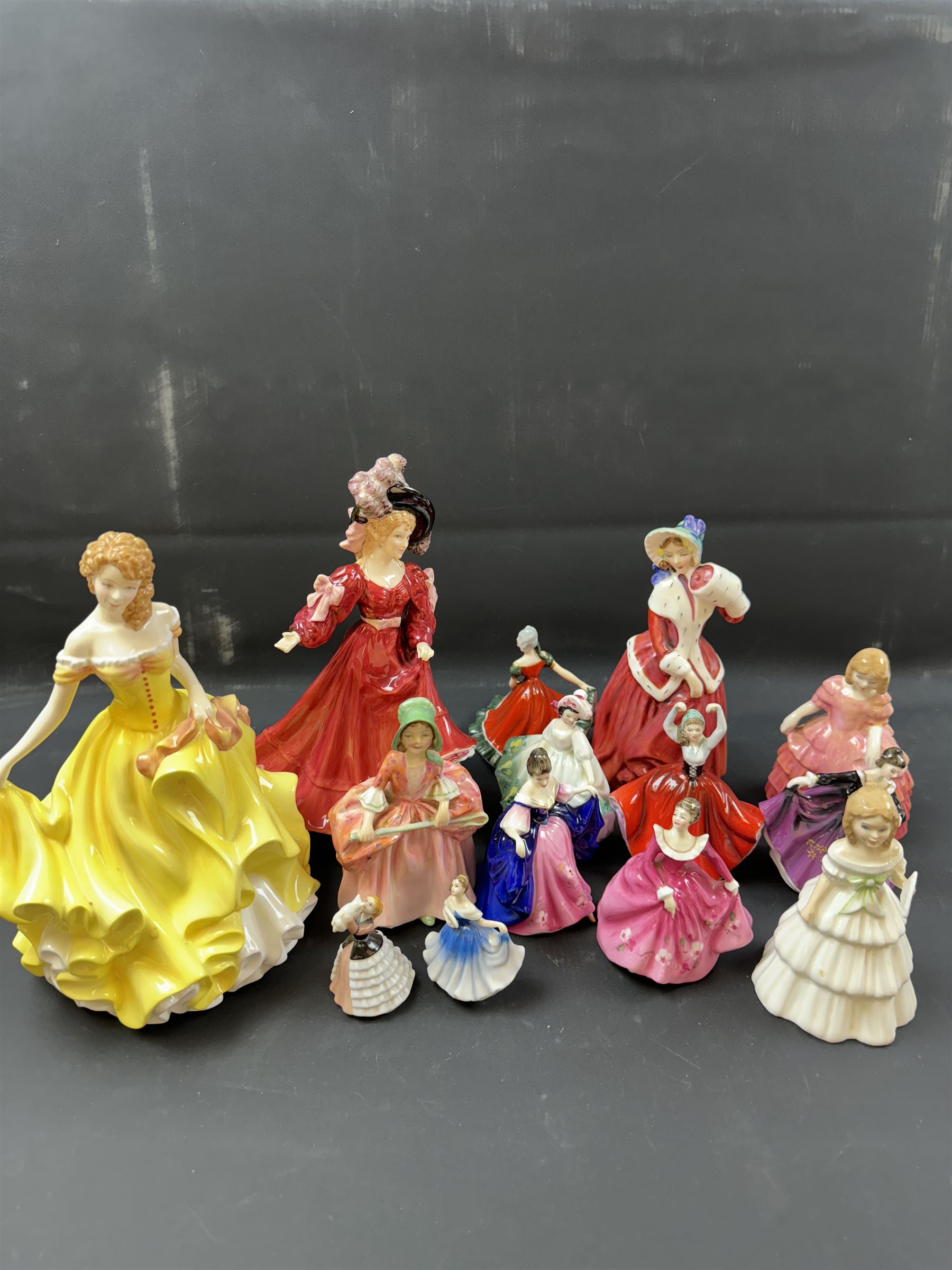 Fourteen Royal Doulton figures, including Bo Peep HN1811, Summer HN5322, Patricia HN3365 etc 