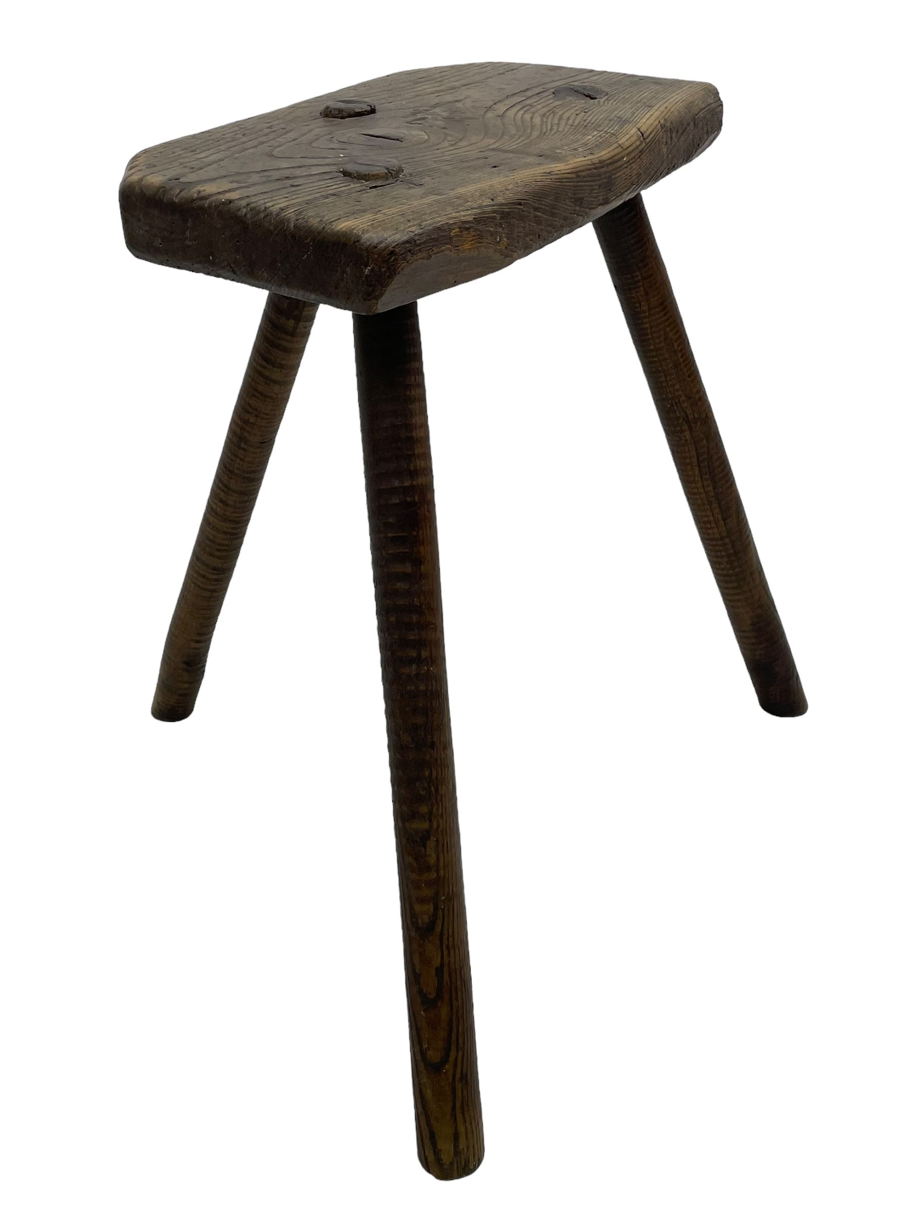 19th century elm cutler's stool, shaped seat on three rib turned supports