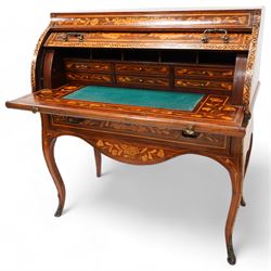 19th century Dutch marquetry cylinder bureau or desk, the cylinder roll inlaid with scrolling acanthus leaves and putti riding dolphins, hook scrolling border, the interior fitted with small drawers, pigeon holes and retractable writing surface, single drawer below inlaid with trailing foliate branches, on cabriole supports with gilt metal mounts