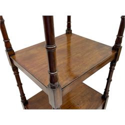 Regency mahogany etagere, the hinged and adjustable top over two tiers and single drawer, turned supports on brass cups and castors 