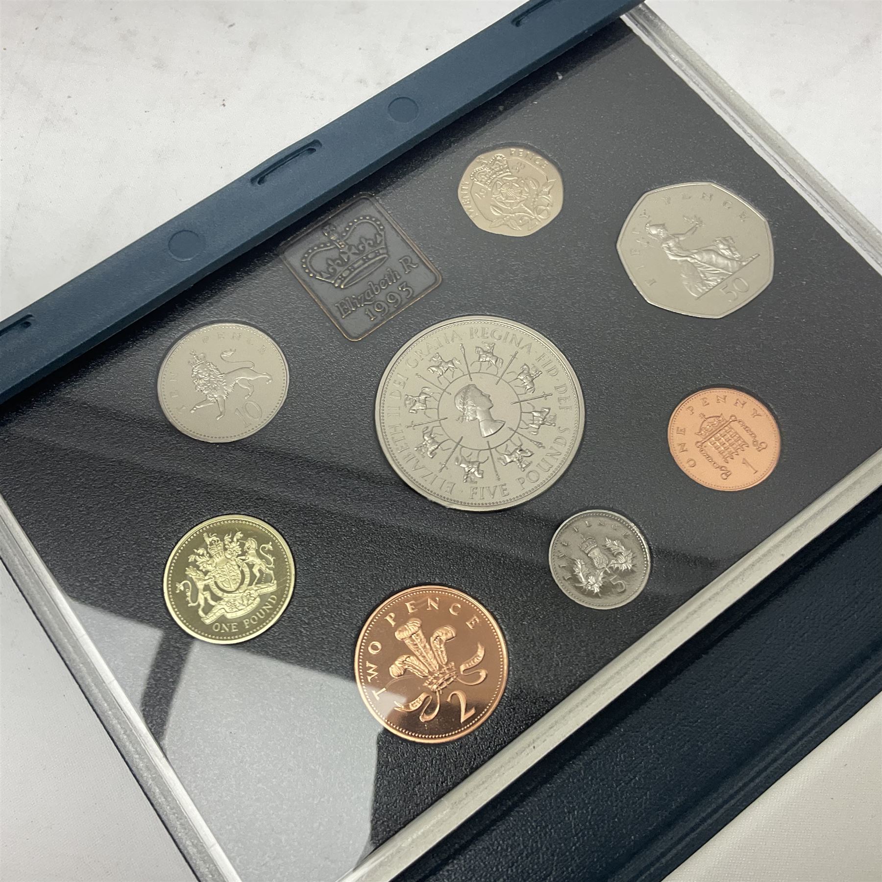 Ten The Royal Mint United Kingdom proof coin collections, dated 1983, 1984, 1985, 1986, 1987, 1992, 1994, two 1997 and 1998 all in blue folders with certificates