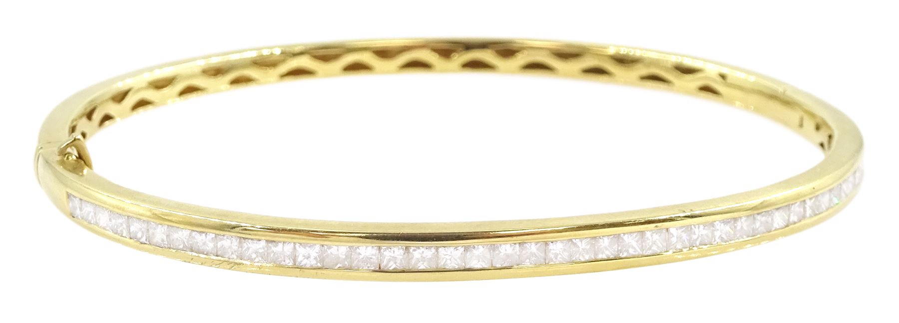 18ct gold diamond hinged bangle with forty-three channel set, princess cut diamonds, hallmarked