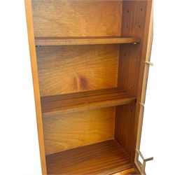 Mid-to-late 20th century yew wood bureau bookcase, raised bookcase enclosed by glazed door, the fall front revealing fitted interior, four graduating cock-beaded drawers below, on bracket feet