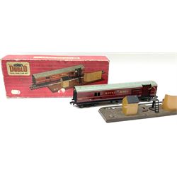 Hornby Dublo - two-rail 4MT Standard 2-6-4 Tank locomotive No.80054 in blue striped box; another matching unboxed locomotive with additional locomotive body; and a T.P.O. Mail Van Set in red striped box (4)