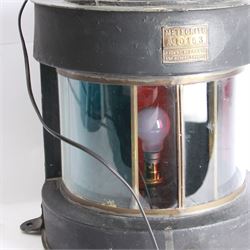 Meteorite ship's lamp converted to electricity, painted in black matte finish, with applied brass plaque inscribed 'Trawler' and a further plaque inscribed 'Meteorite A10153', H42cm