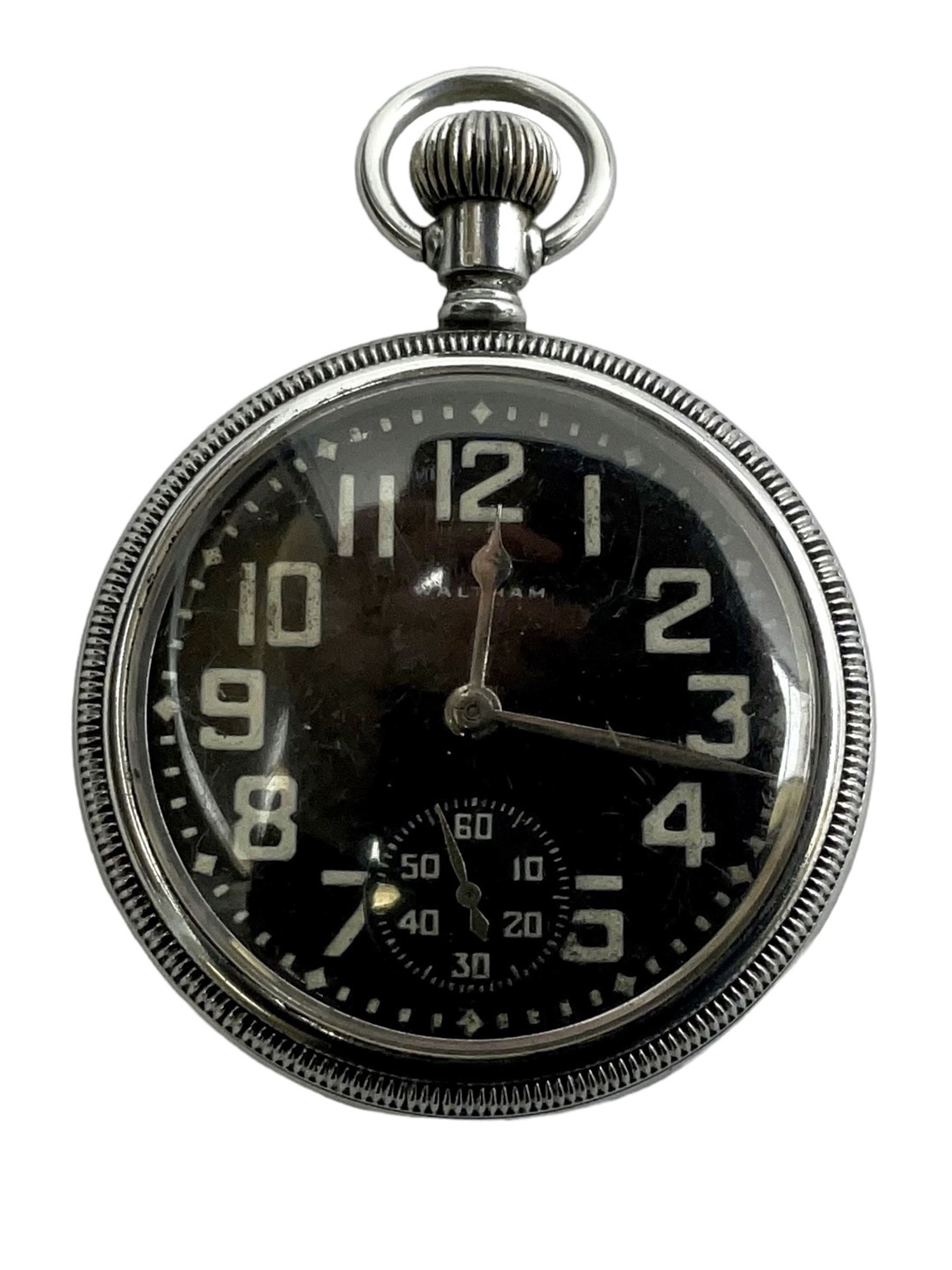 Waltham military open face pocket watch, with signed black dial and subsidiary seconds dial, the case back engraved with broad arrow and 30812907 