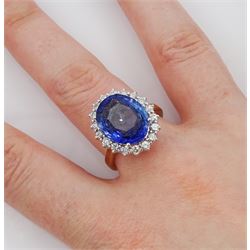 18ct gold oval cut unheated sapphire and round brilliant cut diamond ring, sapphire 7.46 carat, total diamond weight approx 0.70 carat, with Reunigem-Lab report