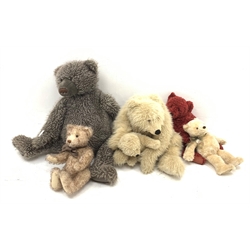 Five Gund teddy bears, comprising two large examples first edition The Bear Necessity 9541 256/500, and limited edition Gray Lord 9522 424/460, plus first edition Strawberry Sue Preme 9536 349/375, second edition Hanna 95071 289/300, and Calvin 6471. 