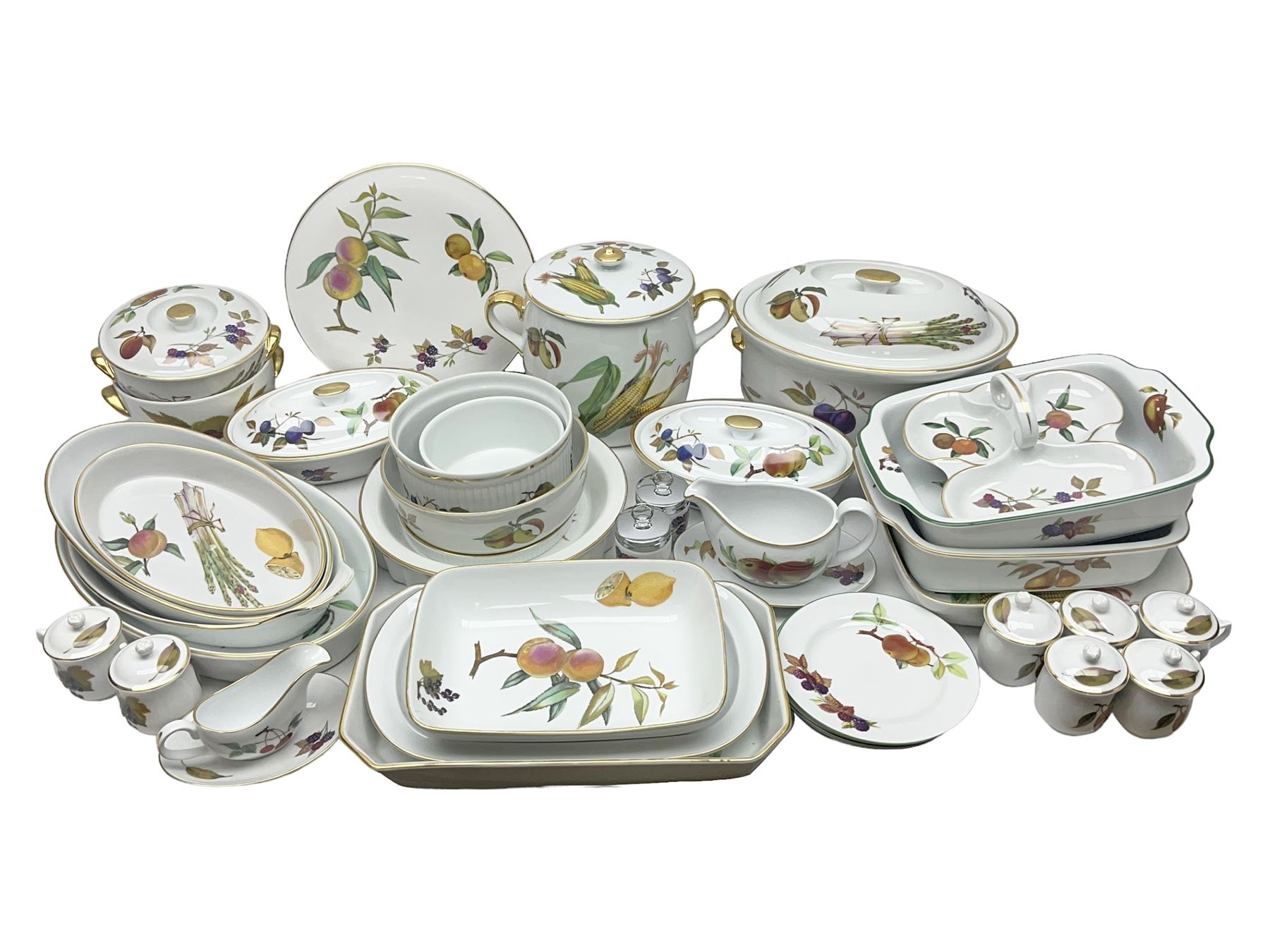 Royal Worcester Evesham pattern, including covered pot de cremes, twin handle tureen, serving dishes, flan dishes, side plates etc  