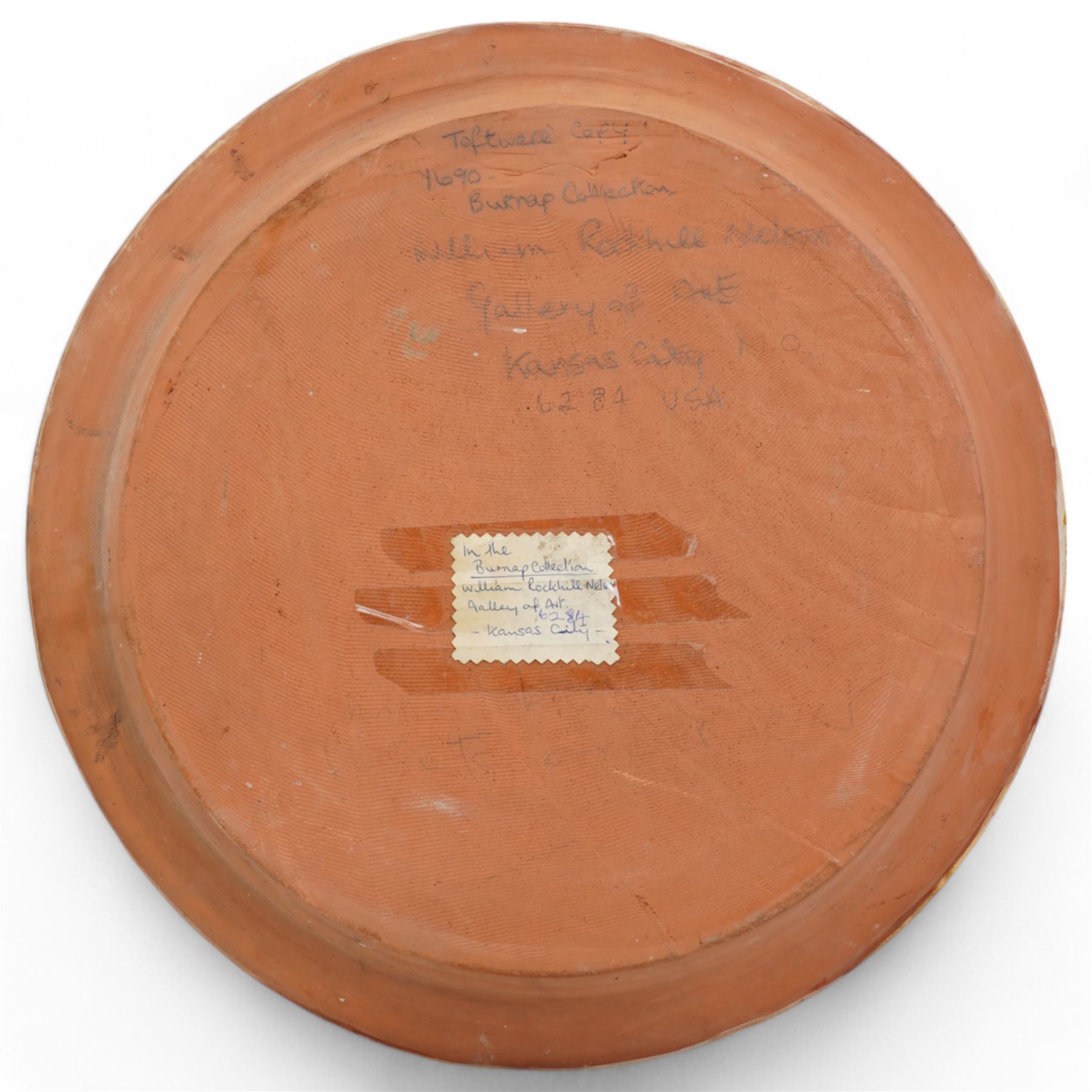 Large slipware charger in the style of Thomas Toft, centrally decorated with a male figure and the initials R.W, within a cross-hatched border, D44cm