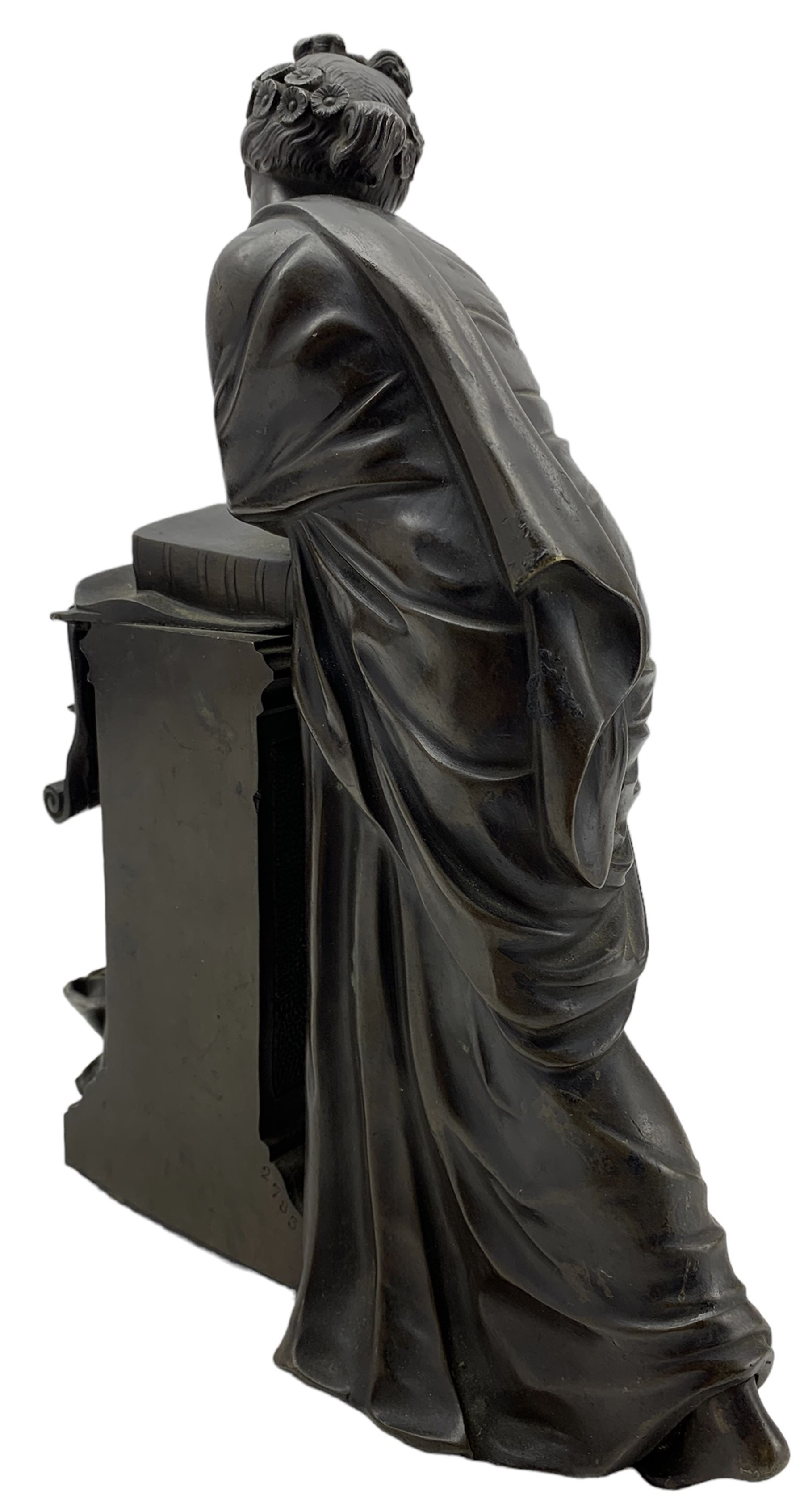 19th century French bronze sculpture of a Classical female muse leaning against a pedestal applied with a book, unsigned, numbered verso 2783, H26cm