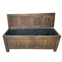 17th century panelled oak blanket chest or kist, quadruple panelled hinged lid over quadruple panelled front, moulded frame and pegged construction, on stile supports