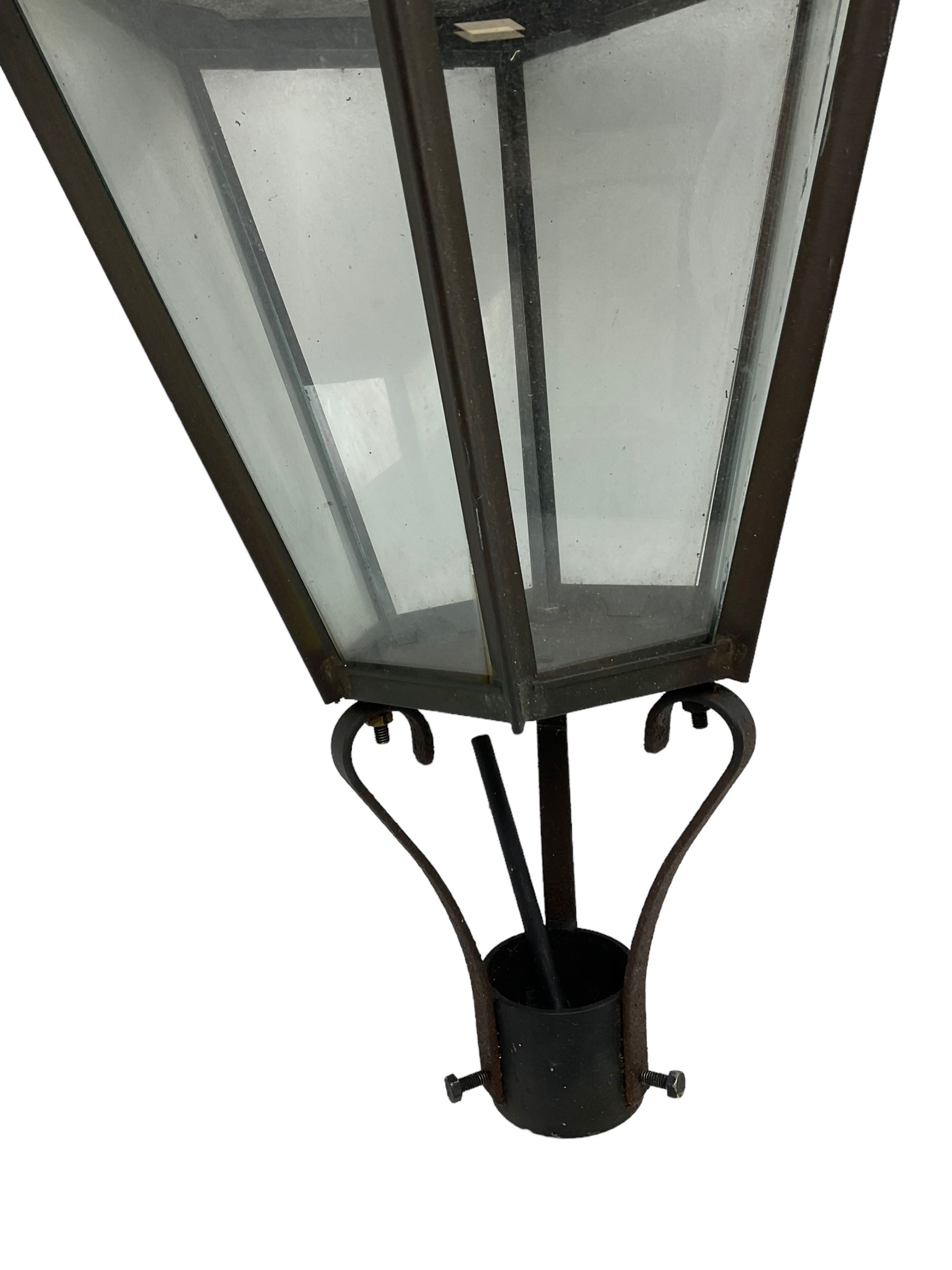 Victorian design six glass lantern, hexagonal tapered from with finial, scrolled lower supports on bracket