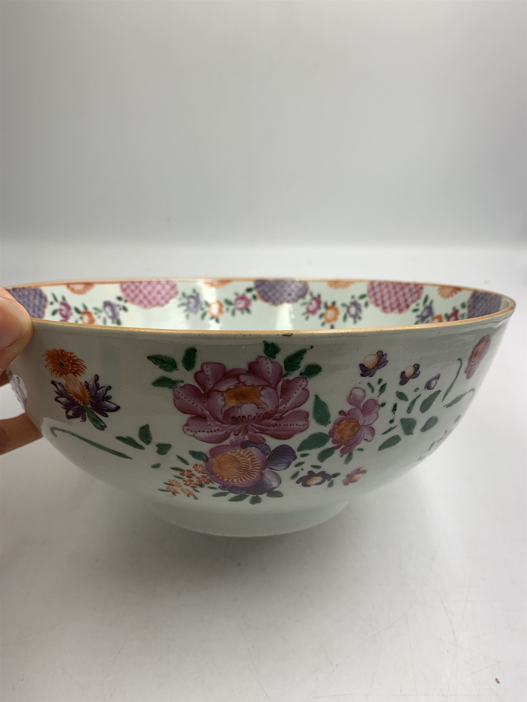 19th century Chinese famille rose bowl decorated with sprays of flowers with pink lattice panels to the border D23cm