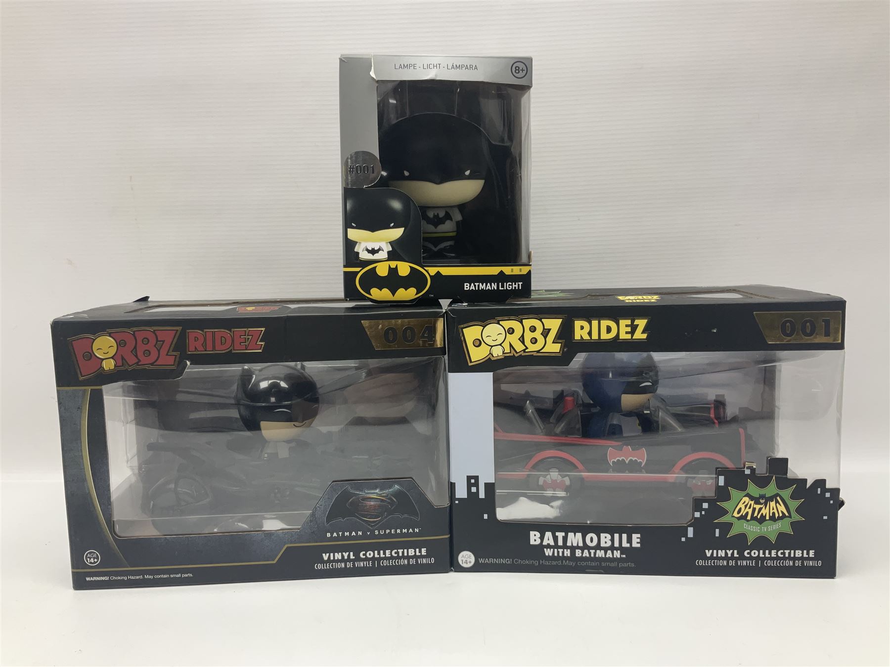 Thirteen Funko! Pop figurines of predominately Batman interest, to include 2016 ‘Batman Classic TV Series Batmobile’ and 2019 teal coloured ‘Batman’ Summer Convention exclusives, most in original boxes, with three similar boxed figures (16)