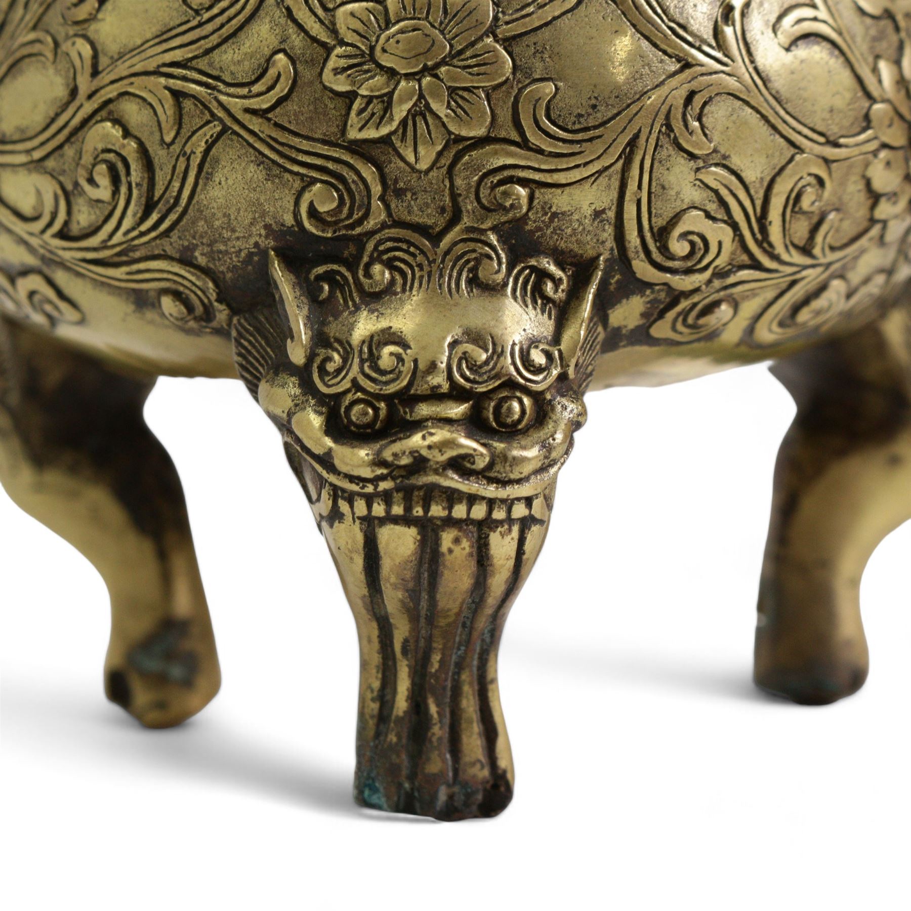 Chinese polished bronze incense burner and cover, pierced domed cover with temple lion finial, the base cast with scrolling foliage on tripod temple lion mask legs, Xuande seal mark, H18cm 