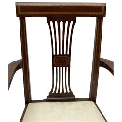 Set of four (2+2_ Edwardian inlaid mahogany dining chairs, cresting rail with satinwood banding, pierced splat backs with central inlay, drop-in seats upholstered in foliate patterned ivory fabric, raised on square tapering supports terminating in spade feet