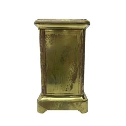 French - late 19th century 8-day mantle clock in an engraved brass corniche case with three rectangular porcelain panels decorated in the romantic Sevres style, dial with brass hands, cartouche Roman numerals and a depiction of cupid to the dial centre, rack striking movement sounding the hours and half hours on a bell. With pendulum.