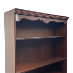 Rossmore Furniture - pair of open mahogany bookcases 