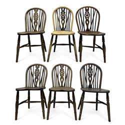 Mid-to-late 20th century set of six elm and beech Windsor dining chairs, hoop and stick back with pierced wheel splat, dished elm seat, on turned supports united by turned stretchers 