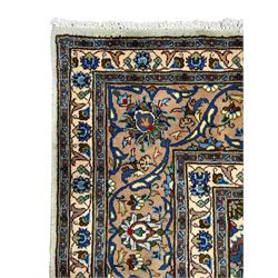 Persian Kashmar pale green ground rug, shaped central medallion decorated with stylised flower heads, the surrounding field with scrolling leafy branches and palmettes, the spandrels and border decorated with further palettes, within floral pattern guard stripes