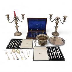 Two cases of six plated lobster picks by Garrards, pair of plated three light candelabra, Victorian plated coaster, plated salver and assorted cutlery