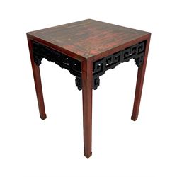 Late 19th century Chinese Qing dynasty red and black lacquered wood tall tea table, Shanxi region, square top over geometric scroll fretwork panels, on square supports with hoof feet 