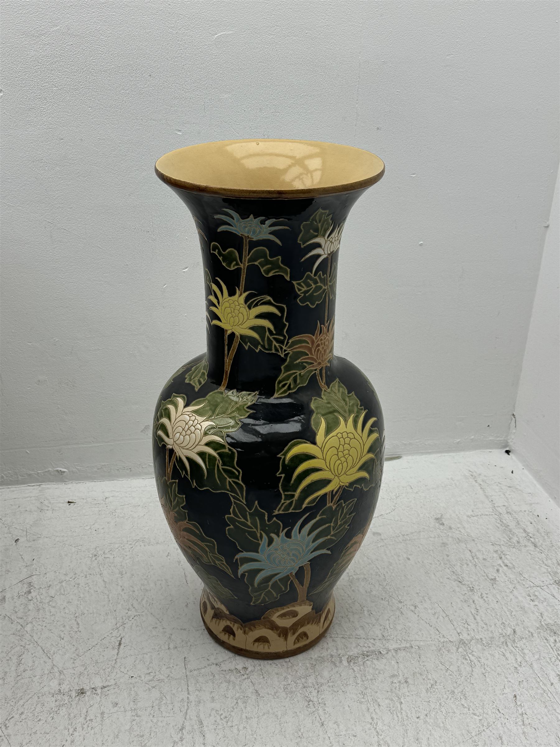 Floor vase with stylised flowers on a black ground, H84cm