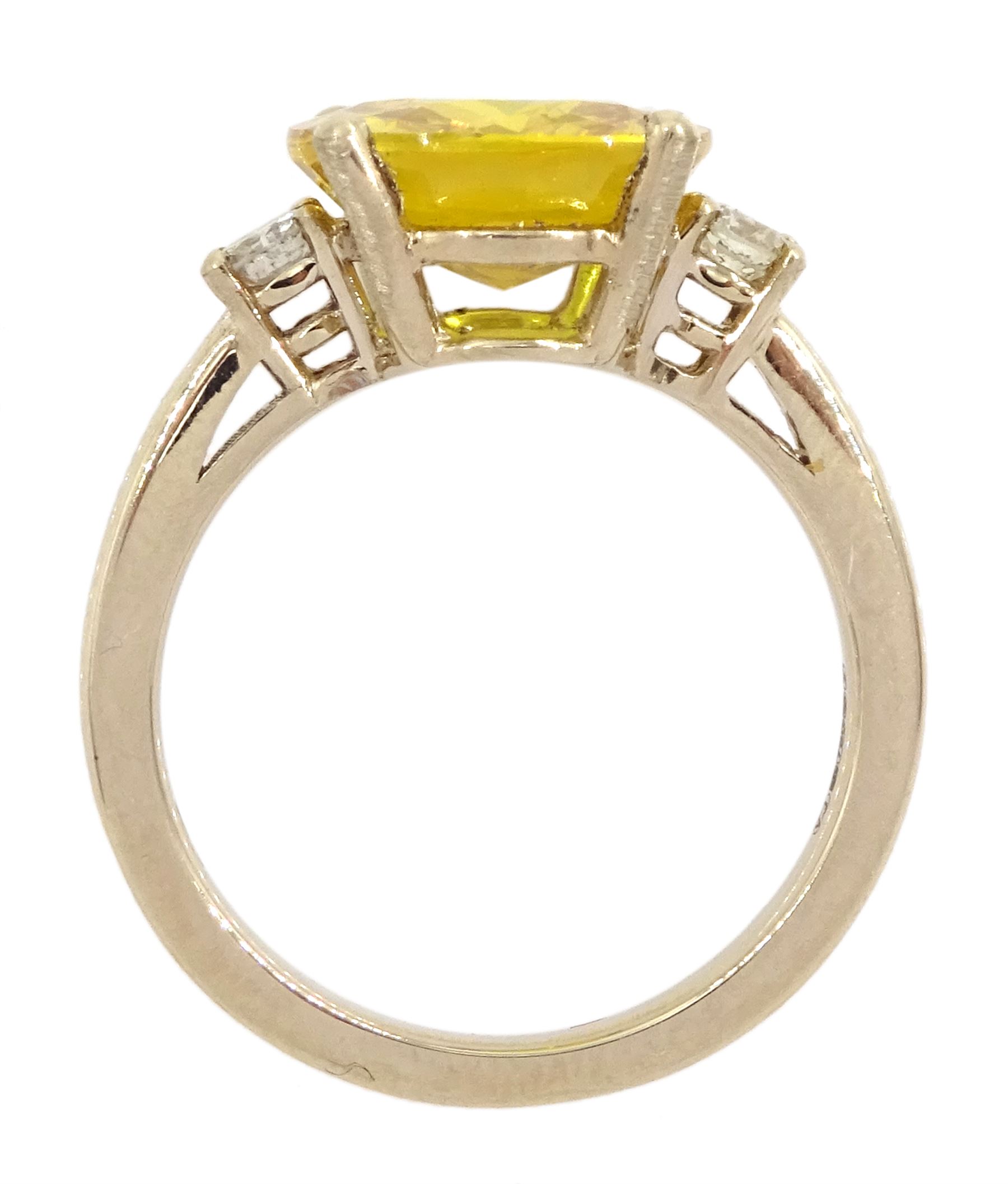 18ct gold three stone yellow sapphire and round brilliant cut diamond ring, hallmarked, yellow sapphire approx 5.20 carat