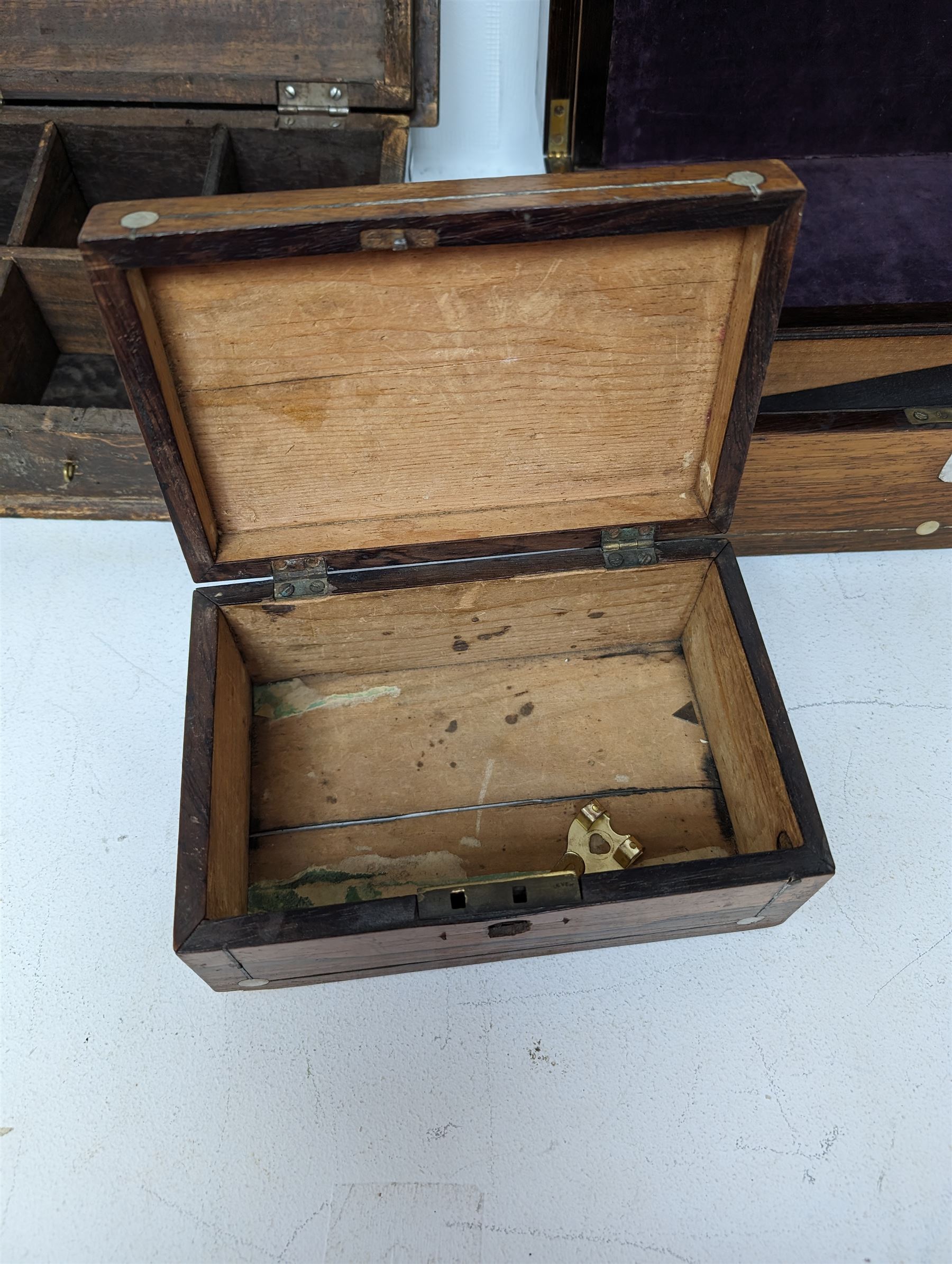 Brass bound wooden box, the hinged lid opening to reveal compartments, together with two other boxes 