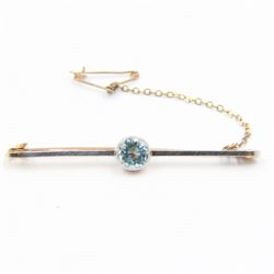 Art Deco 15ct gold and platinum bar brooch, milgrain set with a single round topaz, stamped 15ct