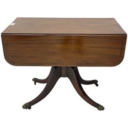 Early 19th century mahogany supper table, rectangular reed moulded drop-leaf top with rounded corners, fitted with single end drawer, on turned pedestal with four out-splayed supports with brass paw castors 