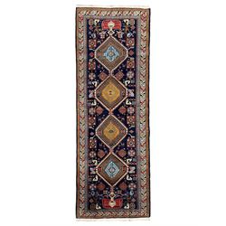 Persian Ardabil indigo ground rug, four interconnected lozenge medallions surrounded by ew...