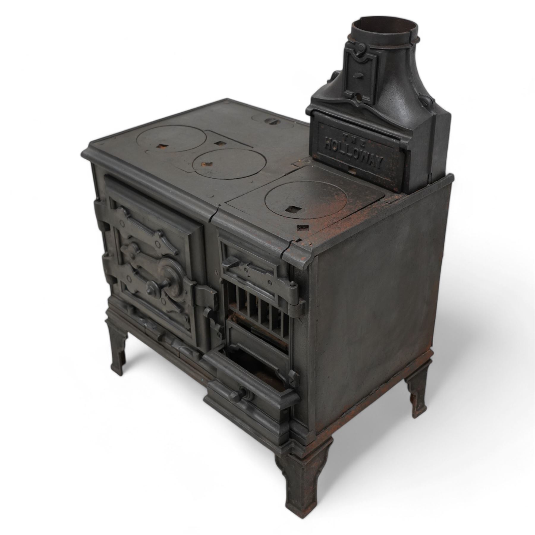 'The Holloway' cast iron portable range stove, fitted with surface burners and oven, on angular bracket feet 