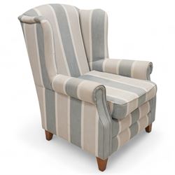 Hardwood-framed wingback armchair, upholstered blue and white striped fabric, on tapering feet 