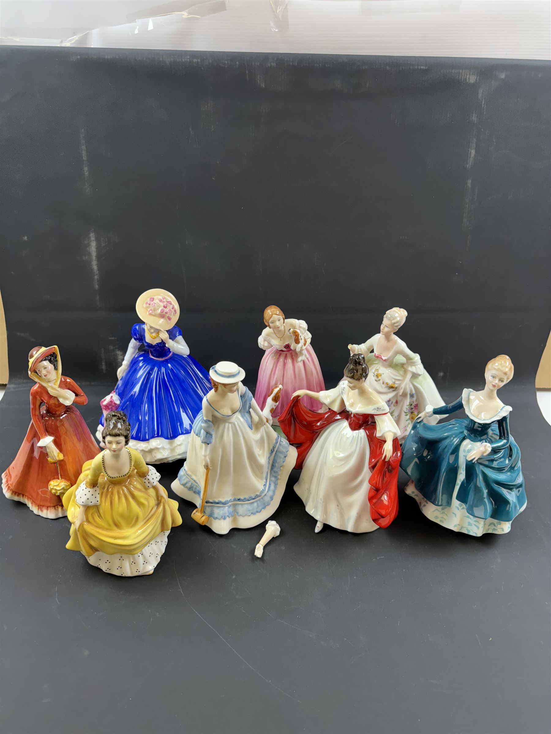 Fourteen Royal Doulton figures, including Sara HN2265, Summertime HN3137, Coralie HN2307, Janine HN2461  