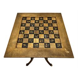 Late 19th century walnut games table, the square top with sunken inlaid chessboard decorated with inlaid floral bouquets, shaped and pierced frieze rails, on quadruple spiral turned pillars, concaved square platform inlaid with flowers, on acanthus leaf carved splayed supports with scrolled terminals 