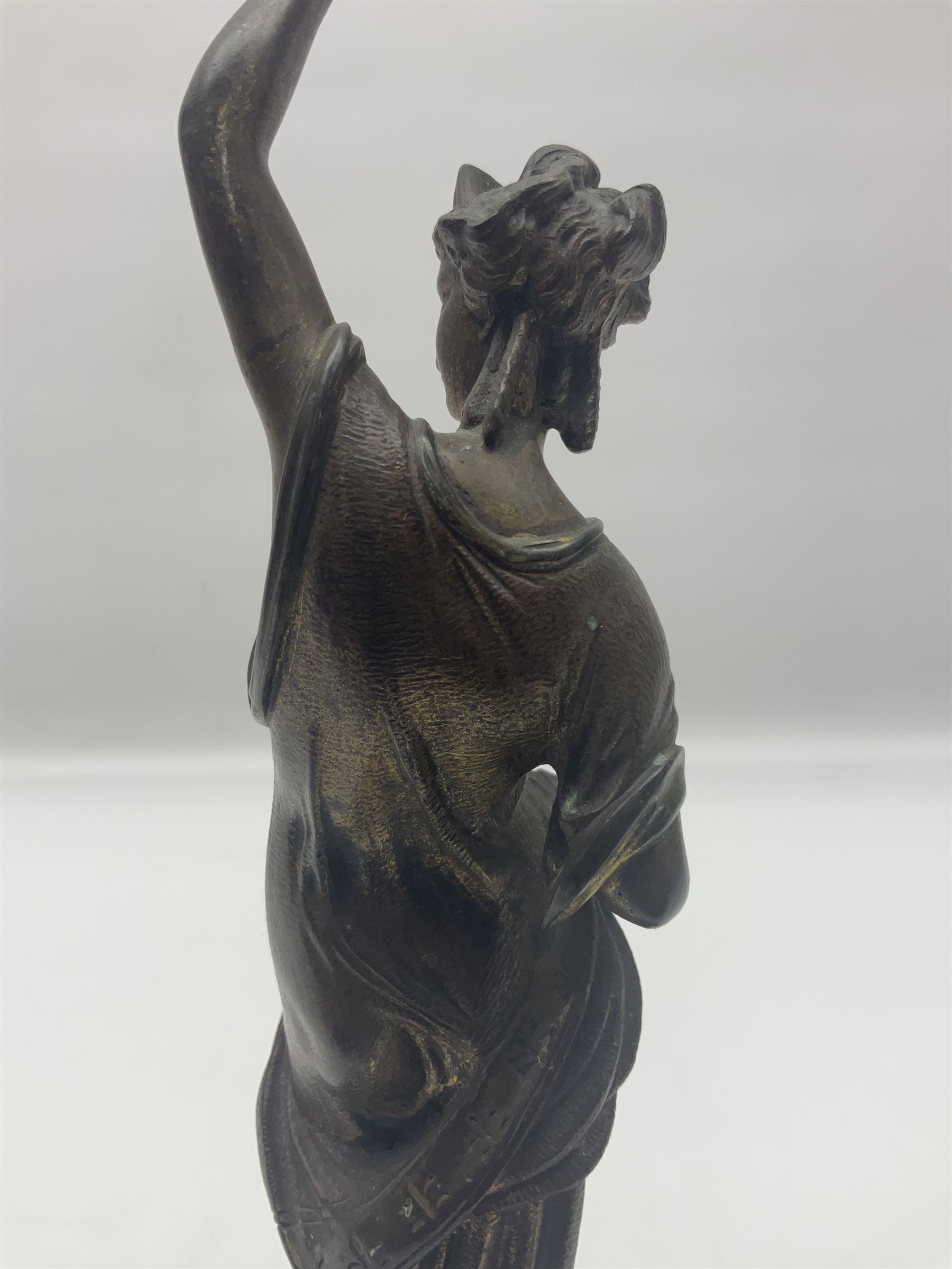 Gilt bronze figure of a lady in neo-classical dress, on a circular wooden plinth, H26cm