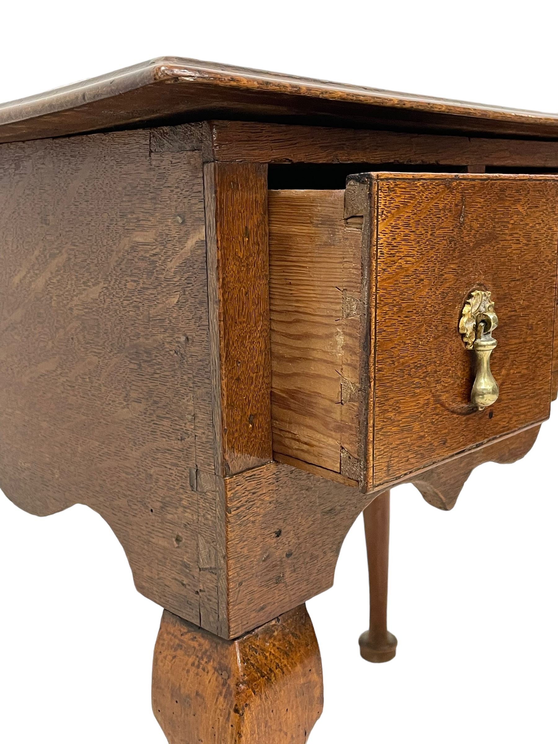 18th century oak low-boy, rectangular moulded top over three drawers with scratch mouldings, shaped apron, on cabriole supports