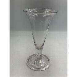 Large 18th century ale glass, circa 1780, with drawn trumpet bowl and flared rim, teardrop stem on a domed folded foot, H20cm